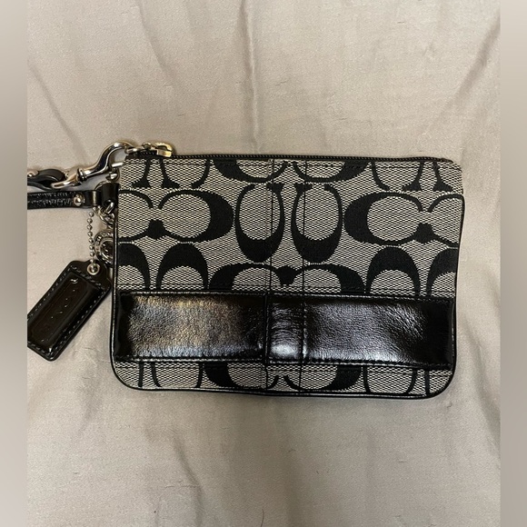Coach Handbags - Coach Signature Black and Tan Wristlet No Flaws